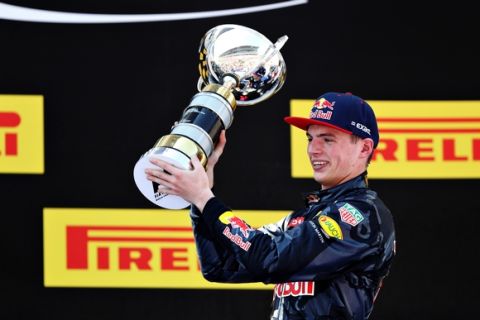 MONTMELO, SPAIN - MAY 15:  Max Verstappen of Netherlands and Red Bull Racing celebrates his first win on the podium during the Spanish Formula One Grand Prix at Circuit de Catalunya on May 15, 2016 in Montmelo, Spain.  (Photo by Mark Thompson/Getty Images)