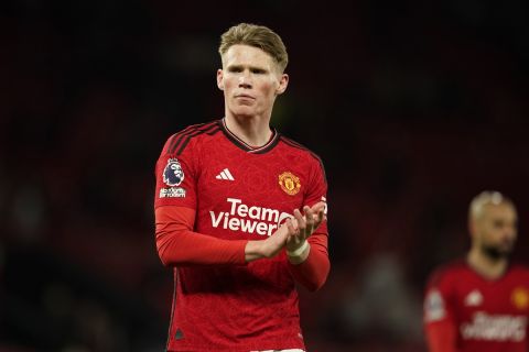 Manchester United's Scott McTominay waves his fans at the end of the English Premier League soccer match between Manchester United and Sheffield at the Old Trafford Stadium in Manchester, England, Wednesday, April 24, 2024. Manchester United won 4-2. (AP Photo/Dave Thompson)