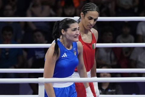 Algeria's Imane Khelif, right, defeated, Italy's Angela Carini in their women's 66kg preliminary boxing match at the 2024 Summer Olympics, Thursday, Aug. 1, 2024, in Paris, France. (AP Photo/Ariana Cubillos)