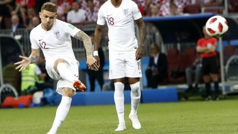 England's Kieran Trippier scores his side's opening goal during the semifinal match between Croatia and England at the 2018 soccer World Cup in the Luzhniki Stadium in, Moscow, Russia, Wednesday, July 11, 2018. (AP Photo/Alastair Grant)