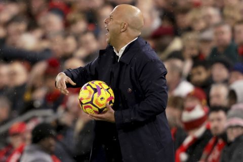 Liverpool's manager Arne Slot reacts during the English Premier League soccer match between Liverpool and Manchester City at Anfield Stadium, Liverpool, England, Sunday Dec. 1, 2024. (AP Photo/Ian Hodgson)