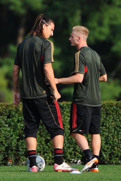 AC Milan's Swedish forward Zlatan Ibrahimovic (L) talks to AC Milan's midfielder Ignazio Abate on September 27, 2011 during a training session at Mlanello in Carnago on the eve of their Champions League matchday 2, Group D football match against Viktoria Plzen. AFP PHOTO / OLIVIER MORIN (Photo credit should read OLIVIER MORIN/AFP/Getty Images)