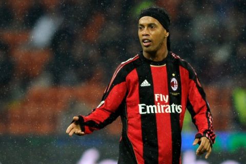 AC Milan's Brazilian forward Ronaldinho gestures during the Italian serie A football match against Fiorentina at San Siro stadium in Milan on November 20, 2010. AC Milan defeated Fiorentina 1-0 . AFP PHOTO / OLIVIER MORIN (Photo credit should read OLIVIER MORIN/AFP/Getty Images)