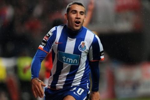 FC Porto's Nicolas Otamend, from Argentina celebrates scoring his secong goal against Sporting Braga in a Portuguese League soccer match at the Municipal Stadium in Braga, Portugal, Sunday, Feb. 13, 2011.(AP Photo/Paulo Duarte)