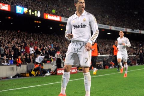 BARCELONA, SPAIN - APRIL 21:  Cristiano Ronaldo of Real Madrid CF celebrates after scoring his team's 2nd goal during the La Liga match between FC Barcelona and Real Madrid CF at Camp Nou on April 21, 2012 in Barcelona, Spain.  (Photo by Denis Doyle/Getty Images)