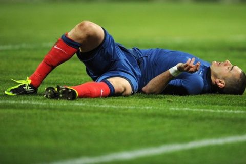 France's forward Karim Benzema reacts on the pitch during the Euro 2012 qualifier football match Luxembourg against France on March 25, 2011 at the Josy Barthel Stadium in Luxembourg. France won 0-2.    AFP PHOTO/ FRANCK FIFE (Photo credit should read FRANCK FIFE/AFP/Getty Images)