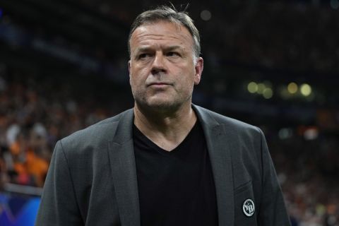 Young Boys' head coach Patrick Rahmen, looks on prior the Champions League play-off second leg soccer match between Galatasaray and Young Boys in Istanbul, Turkey, Tuesday, Aug. 27, 2024. (AP Photo/Francisco Seco)