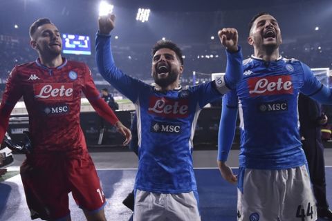 Napoli's Lorenzo Insigne, center, celebrates with teammates after winning the Italian Serie A soccer match between Napoli and Juventus at the Stadio San Paolo in Naples, Italy Sunday Jan. 26, 2020. (Cafaro/LaPresse via AP)