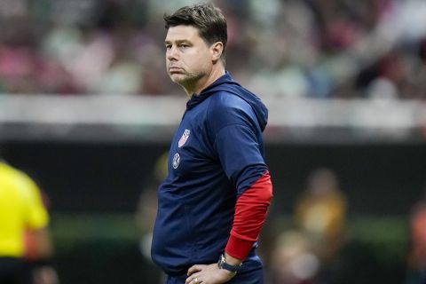 The United States' coach Mauricio Pochettino stands in the sideline during an international friendly soccer match against Mexico at Akron Stadium in Guadalajara, Mexico, Tuesday, Oct. 15, 2024. (AP Photo/Eduardo Verdugo)