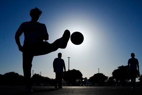 People kick a ball ahead of an MLS soccer match between the LA Galaxy and Real Salt Lake, Saturday, Oct. 14, 2023, in Carson, Calif. (AP Photo/Ryan Sun)