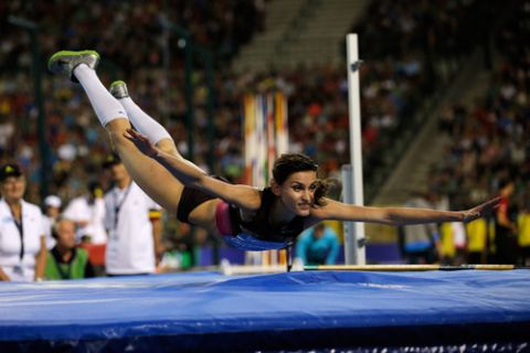 BRUSSELS, BELGIUM - SEPTEMBER 06:  Anna Chicherova of Russia does a back flip on the mat after she competes in the High Jump Womens at the 2013 Belgacom Memorial Van Damme IAAF Diamond League meet at The King Baudouin Stadium on September 6, 2013 in Brussels, Belgium.  (Photo by Dean Mouhtaropoulos/Getty Images)