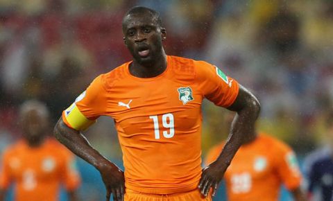 RECIFE, BRAZIL - JUNE 14: Yaya Toure of the Ivory Coast looks on in the rain during the 2014 FIFA World Cup Brazil Group C match  between the Ivory Coast and Japan at Arena Pernambuco on June 14, 2014 in Recife, Brazil.  (Photo by Jamie Squire/Getty Images)