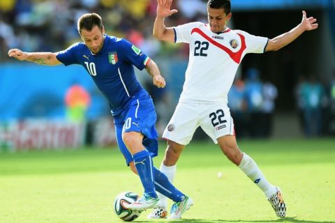 RECIFE, BRAZIL - JUNE 20:  Antonio Cassano of Italy controls the ball past Jose Miguel Cubero of Costa Rica during the 2014 FIFA World Cup Brazil Group D match between Italy and Costa Rica at Arena Pernambuco on June 20, 2014 in Recife, Brazil.  (Photo by Laurence Griffiths/Getty Images)