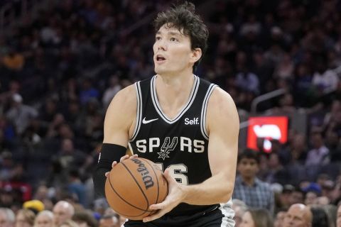 San Antonio Spurs forward Cedi Osman during an NBA preseason basketball game against the Golden State Warriors in San Francisco, Friday, Oct. 20, 2023. (AP Photo/Jeff Chiu)