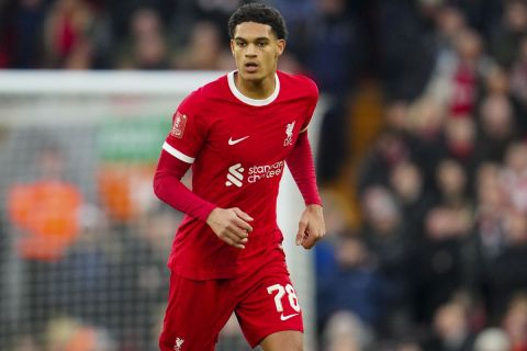 Liverpool's Jarell Quansah controls the ball during the English FA Cup fourth round soccer match between Liverpool and Norwich, at Anfield stadium in Liverpool, England, Sunday, Jan. 28, 2024. (AP Photo/Jon Super)