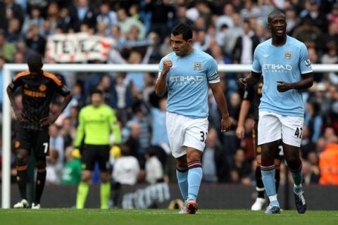 MANCHESTER, ENGLAND - SEPTEMBER 25:  Carlos Tevez of Manchester City celebrates after scoring the opening goal during the Barclays Premier League match between Manchester City and Chelsea at the City of Manchester Stadium on September 25, 2010 in Manchester, England.  (Photo by Michael Steele/Getty Images)