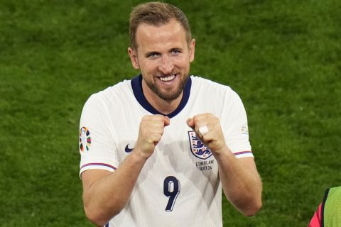 England's Harry Kane celebrates after winning a semifinal match against the Netherlands at the Euro 2024 soccer tournament in Dortmund, Germany, Wednesday, July 10, 2024. (AP Photo/Hassan Ammar)