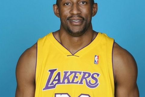 EL SEGUNDO, CA - SEPTEMBER 29: DJ Mbenga #28 of the Los Angeles Lakers poses for a portrait during NBA Media Day on September 29, 2008 at the Toyota Sports Center in El Segundo, California. NOTE TO USER: User expressly acknowledges and agrees that, by downloading and or using this photograph, User is consenting to the terms and conditions of the Getty Images License Agreement. Mandatory Copyright Notice: Copyright 2008 NBAE (Photo by Juan Ocampo/NBAE via Getty Images)