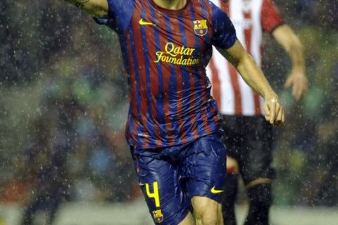 Barcelona's midfielder Cesc Fabregas celebrates his goal during the Spanish league football match Athletic Bilbao vs Barcelona, at San Mames stadium, in Bilbao, on November 6, 2011. Match ended 2-2 in a draw.   AFP PHOTO / RAFA RIVAS (Photo credit should read RAFA RIVAS/AFP/Getty Images)