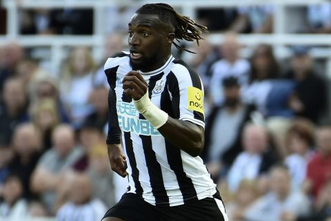 Newcastle's Allan Saint-Maximin controls the ball during the English Premier League soccer match between Newcastle United and Manchester City at St James Park in Newcastle, England, Sunday, Aug.21, 2022. (AP Photo/Rui Vieira)