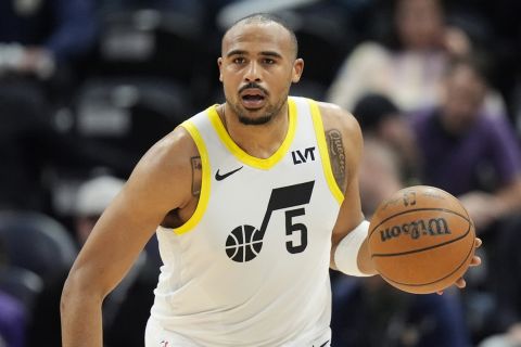 Utah Jazz guard Talen Horton-Tucker (5) brings the ball up court during the second half of an NBA basketball game against the Cleveland Cavaliers Tuesday, April 2, 2024, in Salt Lake City. (AP Photo/Rick Bowmer)