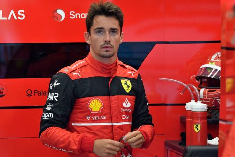 Ferrari driver Charles Leclerc of Monaco in his garage prior to the qualifying session ahead of the Formula One Grand Prix at the Spa-Francorchamps racetrack in Spa, Belgium, Saturday, Aug. 27, 2022. The Belgian Formula One Grand Prix will take place on Sunday. (AP Photo/Geert Vanden Wijngaert, Pool)