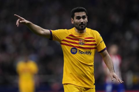 Barcelona's Ilkay Gundogan gestures during the La Liga soccer match between Atletico Madrid and Barcelona at the Metropolitano stadium in Madrid, Spain, Sunday, March 17, 2024. (AP Photo/Bernat Armangue)