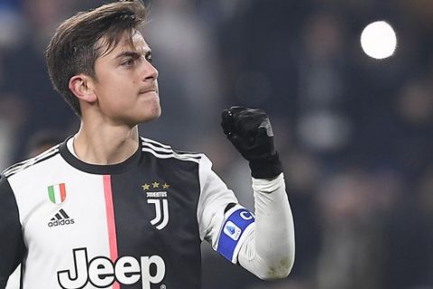 Juventus' Paulo Dybala celebrates after scoring during the Italian Cup soccer match between Juventus and Udinese, at the Allianz Stadium in Turin, Italy, Wednesday, Jan. 15, 2020. (Fabio Ferrari/LaPress via AP)