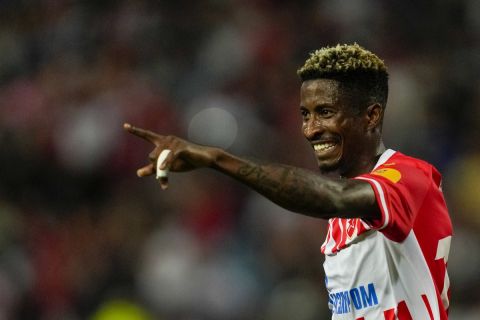 Red Star's Peter Olayinka celebrates after scoring his side's fourth goal during an international friendly soccer match between Red Star and Fiorentina at the Rajko Mitic Stadium in Belgrade, Serbia, Wednesday, July 26, 2023. (AP Photo/Darko Vojinovic)