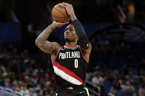 Portland Trail Blazers' Damian Lillard takes an open shot against the Orlando Magic during the second half of an NBA basketball game, Thursday, Oct. 25, 2018, in Orlando, Fla. (AP Photo/John Raoux)