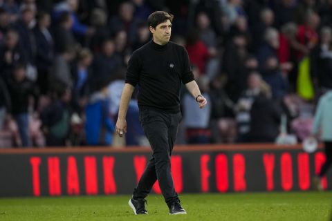 Bournemouth's head coach Andoni Iraola leaves the field after the English Premier League soccer match between Bournemouth and Manchester United, at The Vitality Stadium in Bournemouth, England, Saturday, April 13, 2024. (AP Photo/Kirsty Wigglesworth)