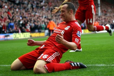 LIVERPOOL, ENGLAND - AUGUST 27:  Charlie Adam of Liverpool celebrates scoring his side's third goal during the Barclays Premier League match between Liverpool and Bolton Wanderers at Anfield on August 27, 2011 in Liverpool, England.  (Photo by Clive Brunskill/Getty Images)