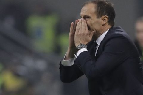 Juventus coach Massimiliano Allegri calls out to his players during a Serie A soccer match between AC Milan and Juventus, at Milan's San Siro stadium, Sunday, Nov. 11, 2018. (AP Photo/Luca Bruno)