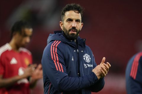 Manchester United's head coach Ruben Amorim applauds fans after the English Premier League soccer match between Manchester United and Bournemouth at the Old Trafford stadium in Manchester, England, Sunday, Dec. 22, 2024. (AP Photo/Dave Thompson)