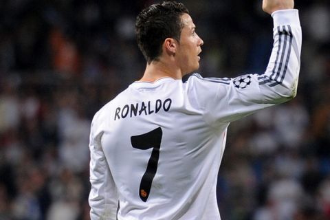 MADRID, SPAIN - MARCH 18:  Cristiano Ronaldo of Real Madrid celebrates after scoring his team's second goal during the UEFA Champions League Round of 16, second leg match between Real Madrid and FC Schalke 04 at Estadio Santiago Bernabeu on March 18, 2014 in Madrid, Spain.  (Photo by Denis Doyle/Getty Images)