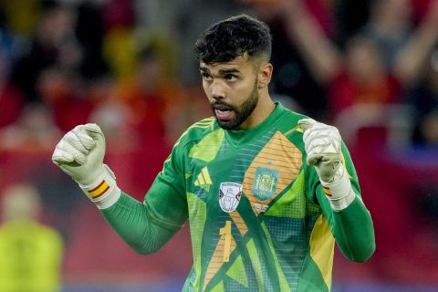 Spain's goalkeeper David Raya reacts after a Group B match between Albania and Spain at the Euro 2024 soccer tournament in Duesseldorf, Germany, Monday, June 24, 2024. (AP Photo/Martin Meissner)