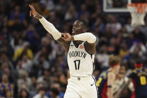 Brooklyn Nets guard Dennis Schroder (17) celebrates after scoring against the Golden State Warriors during the second half of an NBA basketball game in San Francisco, Monday, Nov. 25, 2024. (AP Photo/Jed Jacobsohn)