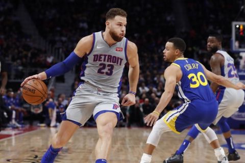 Detroit Pistons forward Blake Griffin brings the ball up court during the first half of an NBA basketball game against the Golden State Warriors, Saturday, Dec. 1, 2018, in Detroit. (AP Photo/Carlos Osorio)