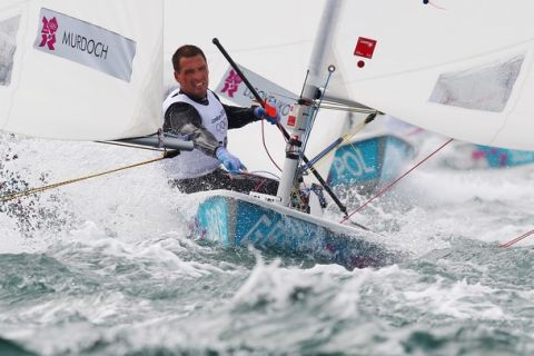 WEYMOUTH, ENGLAND - JULY 31:  Vagelis Cheimonas of Greece competes in the Men's Laser Sailing on Day 4 of the London 2012 Olympic Games at the Weymouth & Portland Venue at Weymouth Harbour on July 31, 2012 in Weymouth, England.  (Photo by Clive Mason/Getty Images)