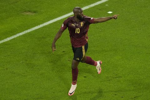 Belgium's Romelu Lukaku celebrates after scoring a goal that was then disallowed for offside during a Group E match between Belgium and Romania at the Euro 2024 soccer tournament in Cologne, Germany, Saturday, June 22, 2024. (AP Photo/Frank Augstein)