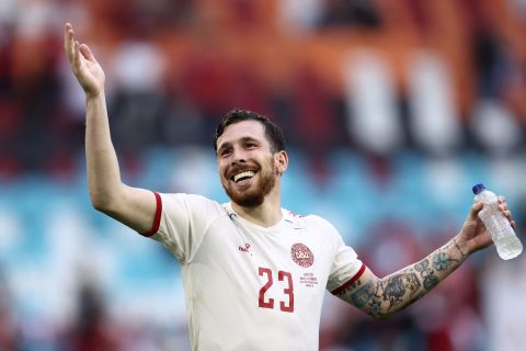 Denmark's Pierre-Emile Hojbjerg celebrates at the end of the Euro 2020 soccer championship round of 16 match between Wales and Denmark at the Johan Cruyff ArenA in Amsterdam, Netherlands, Saturday, June 26, 2021. Denmark won 4-0. (Dean Mouhtaropoulos/Pool via AP)