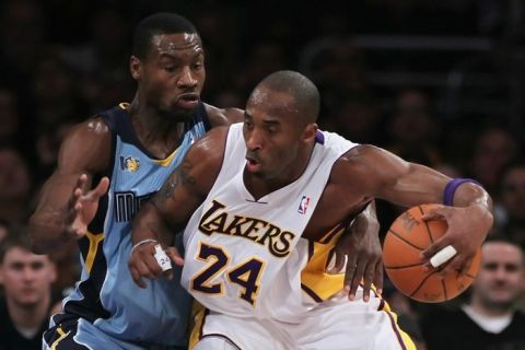 LOS ANGELES, CA - JANUARY 02:  Kobe Bryant #24 of the Los Angeles Lakers is defended by Tony Allen #9 of the Memphis Grizzlies during the first half at Staples Center on January 2, 2011 in Los Angeles, California. NOTE TO USER: User expressly acknowledges and agrees that, by downloading and or using this photograph, User is consenting to the terms and conditions of the Getty Images License Agreement.  (Photo by Jeff Gross/Getty Images)