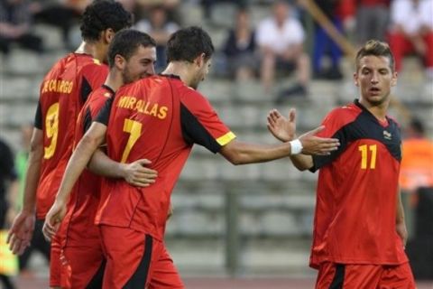 Belgium's players cheer, after Eden Hazard scored against Montenegro, during a friendly soccer match at the King Baudouin stadium in Brussels, Friday, May 25, 2012. (AP Photo/Yves Logghe)