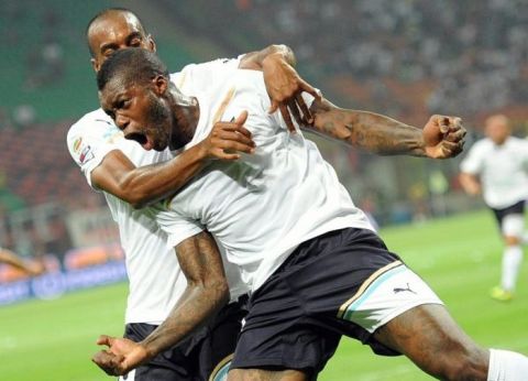 WCENTER 0XLJAJVKGI                French forward of Ss Lazio, Djibril Cisse', jubilates after scoring the second goal against Ac Milan during their Italian Serie A soccer match at Giuseppe Meazza stadium in Milan, Italy on 09 September 2011. ANSA/DANIEL DAL ZENNARO 