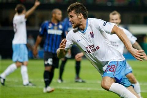 Trabzonspor defender Ondrej Celustka, of Czech Rpublic, celebrates after scoring during a Champions League, group B soccer match, between Inter Milan and Trabzonspor at the San Siro stadium in Milan, Italy, Wednesday, Sept. 14, 2011. Trabzonspor won 1-0. (AP Photo/Antonio Calanni)