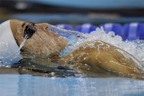 Greece's Theodora Drakou competes in a heat of the women's 50m Backstroke at the FINA Swimming World Championships in Shanghai, China, Wednesday, July 27, 2011. (AP Photo/Michael Sohn) 