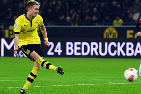 DORTMUND, GERMANY - FEBRUARY 16:  Marco Reus of Dortmund scores his teams first goal during the Bundesliga match between Borussia Dortmund and Eintracht Frankfurt at Signal Iduna Park on February 16, 2013 in Dortmund, Germany.  (Photo by Lars Baron/Bongarts/Getty Images)