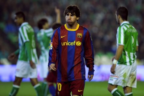 Barcelona's Argentinian forward Lionel Messi grimaces as he reacts during the Spanish King's Cup (Copa del Rey) football match Real Betis vs FC Barcelona on January 19, 2011 at the Benito Villamarin stadium in Sevilla.    AFP PHOTO/ JORGE GUERRERO (Photo credit should read Jorge Guerrero/AFP/Getty Images)