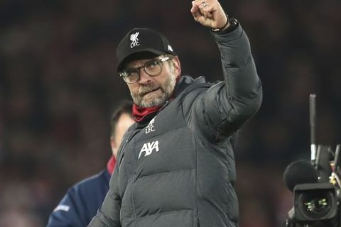 Liverpool's manager Jurgen Klopp celebrates at the end of the English Premier League soccer match between Liverpool and Manchester City at Anfield stadium in Liverpool, England, Sunday, Nov. 10, 2019. Liverpool won 3-1. (AP Photo/Jon Super)