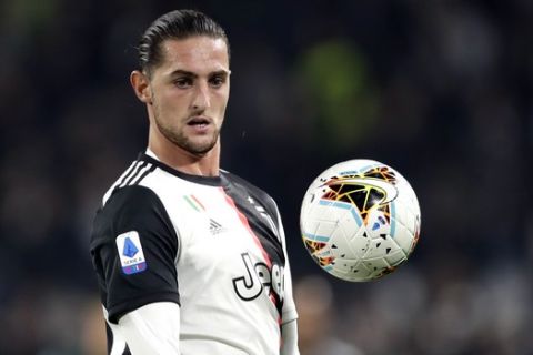 Juventus' Adrien Rabiot controls the ball during a Serie A soccer match between Juventus and Bologna, at the Allianz stadium in Turin, Italy, Saturday, Oct.19, 2019. (AP Photo/Luca Bruno)